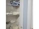 Neatly organized linen closet showcasing ample shelving for storage at 8107 Old London Rd, North Charleston, SC 29406