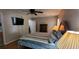 Spacious main bedroom features a ceiling fan, television, and ensuite at 8107 Old London Rd, North Charleston, SC 29406