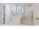 Bright bathroom features a shower, soaking tub, and window providing natural light at 83 Creekside Dr, Summerville, SC 29485