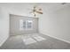 Spacious bedroom with carpet, ceiling fan, and double bi-fold door closets at 83 Creekside Dr, Summerville, SC 29485
