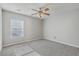 Bedroom with neutral walls, carpet flooring, a ceiling fan, and natural light from a window at 83 Creekside Dr, Summerville, SC 29485