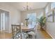 Bright dining area featuring a round table, stylish chairs, and modern decor at 83 Creekside Dr, Summerville, SC 29485