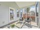 Outdoor screened porch with a seating area and view of the backyard at 83 Creekside Dr, Summerville, SC 29485