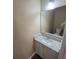 Bathroom with white vanity, granite countertop, and a modern sink, offering a clean design at 9471 Netted Charm Ct, Ladson, SC 29456