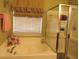 Bathroom featuring a soaking tub and a separate glass enclosed shower at 9677 Islesworth Way, Summerville, SC 29485