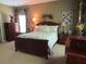 Comfortable main bedroom featuring natural light, a bed, and coordinating decor at 9677 Islesworth Way, Summerville, SC 29485
