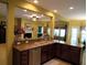 Open-concept kitchen with a breakfast bar and modern stainless steel appliances at 9677 Islesworth Way, Summerville, SC 29485