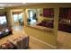 Open-concept living room seamlessly connects to the kitchen and dining areas, creating a welcoming atmosphere at 9677 Islesworth Way, Summerville, SC 29485
