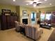 Spacious living room featuring a fireplace, comfortable seating, and natural light at 9677 Islesworth Way, Summerville, SC 29485