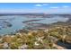 Panoramic aerial view of a coastal community featuring homes with private docks along winding waterways at 1214 Tabby Dr, Folly Beach, SC 29439