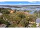 Gorgeous aerial view of waterfront homes with docks and scenic waterways at 1214 Tabby Dr, Folly Beach, SC 29439