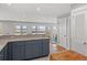 Open concept kitchen with natural light and scenic water view at 1214 Tabby Dr, Folly Beach, SC 29439