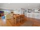 Spacious living and dining area with hardwood floors and abundant natural light at 1214 Tabby Dr, Folly Beach, SC 29439