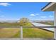 This porch is overlooking the marsh and waterway, offering scenic views of the property's natural setting at 1214 Tabby Dr, Folly Beach, SC 29439