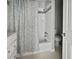 Bathroom with white vanity, shower-tub combo, and new fixtures at 103 Sycamore Dr, Summerville, SC 29485