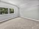 Cozy bedroom with a large window providing natural light and a view of the trees outside at 103 Sycamore Dr, Summerville, SC 29485