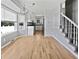 Open kitchen and dining area featuring stainless steel appliances and adjacent stairway at 103 Sycamore Dr, Summerville, SC 29485