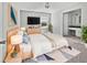 Comfortable main bedroom with a light wood bed frame, TV and ensuite bathroom with vanity at 103 Sycamore Dr, Summerville, SC 29485