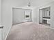 An empty bedroom showing a window and the entry to the en suite bathroom at 103 Sycamore Dr, Summerville, SC 29485