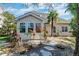 Backyard showcasing a patio, mature trees, stone pathway, and landscaping for a peaceful outdoor retreat at 106 Sago Palm Ct, Summerville, SC 29483