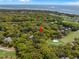 Aerial view of golf community properties showcasing dense tree coverage at 108 High Hammock Villas Dr, Seabrook Island, SC 29455
