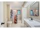 Bathroom with shower and tub combo with designer shower curtain, and a white vanity with stone countertop at 1134 Shadow Lake Cir # 55, Mount Pleasant, SC 29464
