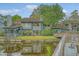 Waterfront home with lush landscaping and a private patio overlooking the tranquil lagoon at 1134 Shadow Lake Cir # 55, Mount Pleasant, SC 29464