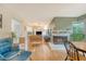 Open floor plan showcasing the living room fireplace, hardwood floors, and views to the kitchen at 1134 Shadow Lake Cir # 55, Mount Pleasant, SC 29464