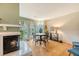 Inviting living room features a fireplace, hardwood floors, and access to an outdoor patio at 1134 Shadow Lake Cir # 55, Mount Pleasant, SC 29464
