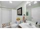 Well-lit bathroom featuring a shower-tub combination, a vanity with storage and neutral tones at 118 Congress St # F, Charleston, SC 29403