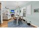Charming living room with fireplace, hardwood flooring, and natural light at 118 Congress St # F, Charleston, SC 29403