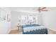 Bright bedroom featuring a ceiling fan and large windows providing natural light at 118 Regent St, Summerville, SC 29483