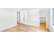 A bright bedroom with an open closet and one large window at 118 Regent St, Summerville, SC 29483