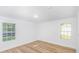 A bright bedroom with two large windows at 118 Regent St, Summerville, SC 29483