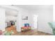 Entryway features hardwood floors, modern trim and bench, and access to the kitchen at 118 Regent St, Summerville, SC 29483