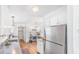 Well-lit kitchen offers modern appliances and custom desk space at 118 Regent St, Summerville, SC 29483