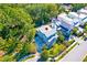 Aerial view of a charming two-story home with mature landscaping and a metal roof at 1212 Clonmel Pl, Mount Pleasant, SC 29464