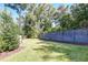 Spacious backyard featuring a lush lawn and a modern horizontal privacy fence at 1212 Clonmel Pl, Mount Pleasant, SC 29464