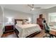 Comfortable bedroom featuring hardwood floors, neutral walls, and modern furnishings at 1212 Clonmel Pl, Mount Pleasant, SC 29464