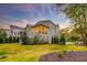 Well-manicured backyard showcasing home's architecture at 1212 Clonmel Pl, Mount Pleasant, SC 29464