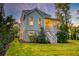Charming two-story home with inviting outdoor spaces and manicured lawn at 1212 Clonmel Pl, Mount Pleasant, SC 29464