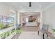 Spacious living room with a comfortable layout, shiplap wall accents, and seamless flow to other living spaces at 1212 Clonmel Pl, Mount Pleasant, SC 29464