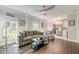 Living room with hardwood floors, neutral paint, and lots of natural light at 1212 Clonmel Pl, Mount Pleasant, SC 29464