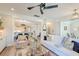 Open-concept living space showcases a seamless flow into dining area, with stylish decor and natural light at 1212 Clonmel Pl, Mount Pleasant, SC 29464