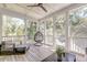 Relaxing screened porch with comfortable seating and scenic views of the surrounding greenery at 1212 Clonmel Pl, Mount Pleasant, SC 29464