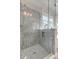 The shower features gray patterned tile, a rainfall shower head, and a glass enclosure at 1212 Clonmel Pl, Mount Pleasant, SC 29464