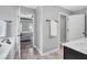 Open-concept bathroom includes access to bedroom and toilet with dark cabinetry at 123 Mcdonald Ct, Summerville, SC 29485