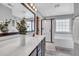 Stylish bathroom featuring a double vanity, a soaking tub, a glass enclosed shower, and great lighting at 123 Mcdonald Ct, Summerville, SC 29485