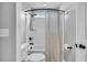 Bright bathroom featuring a shower and toilet with neutral tones at 123 Mcdonald Ct, Summerville, SC 29485