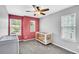 Bright bedroom with neutral walls, carpet, and three windows at 123 Mcdonald Ct, Summerville, SC 29485